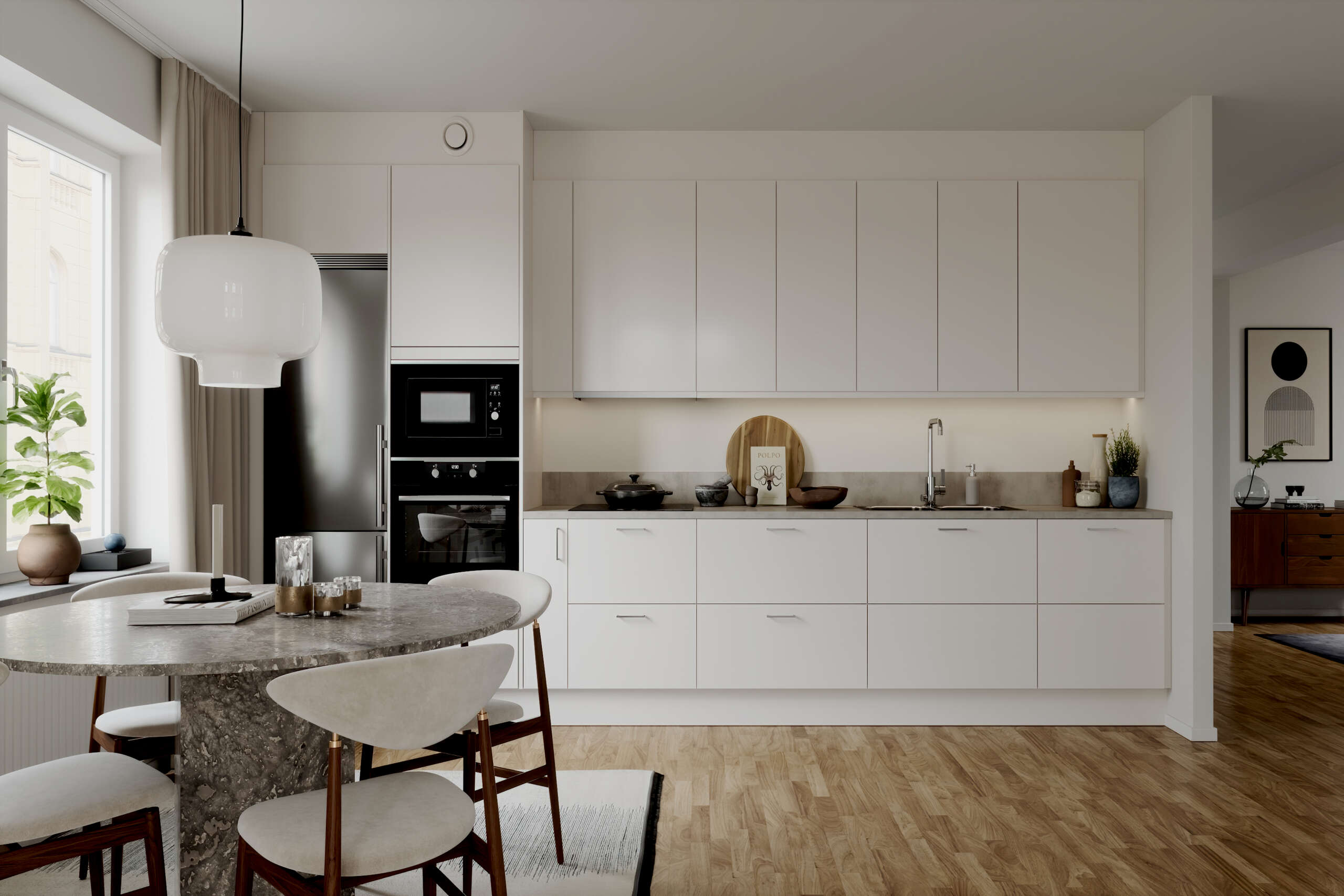 Köket inreds med vita, släta skåpluckor med rostfria handtag samt grå bänkskiva med bakkantlist (visionsbild).