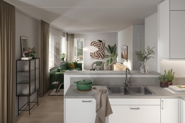 Bostäderna har en noga genomtänkt inredning, fina materialval och smarta lösningar (visionsbild).
