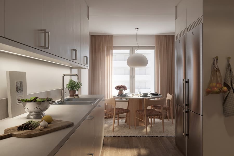 Modernt kök i vitt mot ljus matplats.