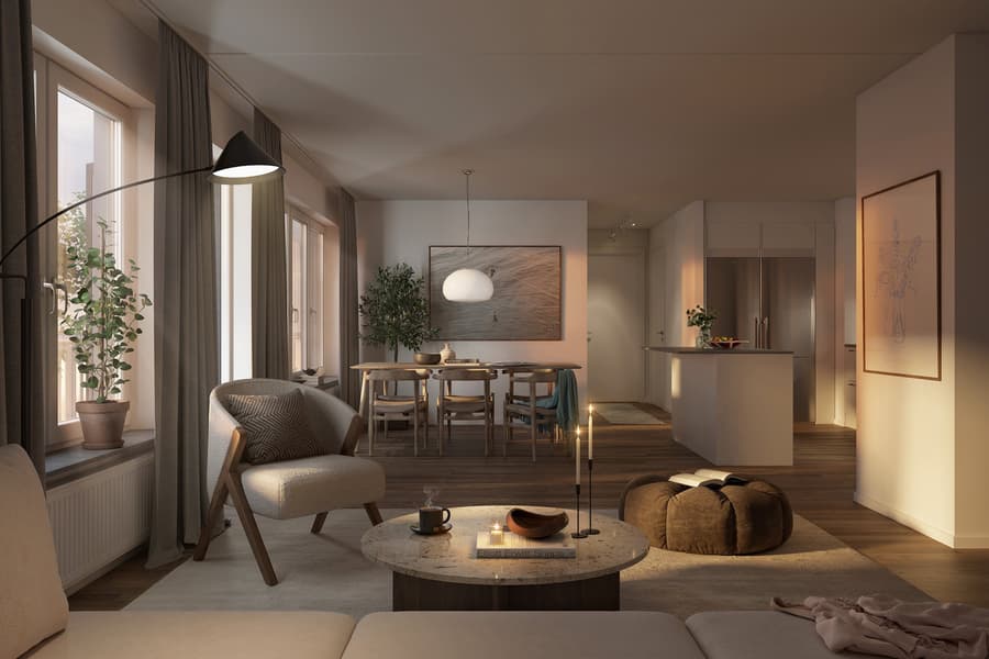 Luftigt vardagsrum med modern inredning och bekväma sittmöbler.